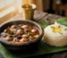 "Sundakai Vattal Kulambu served with steamed rice"